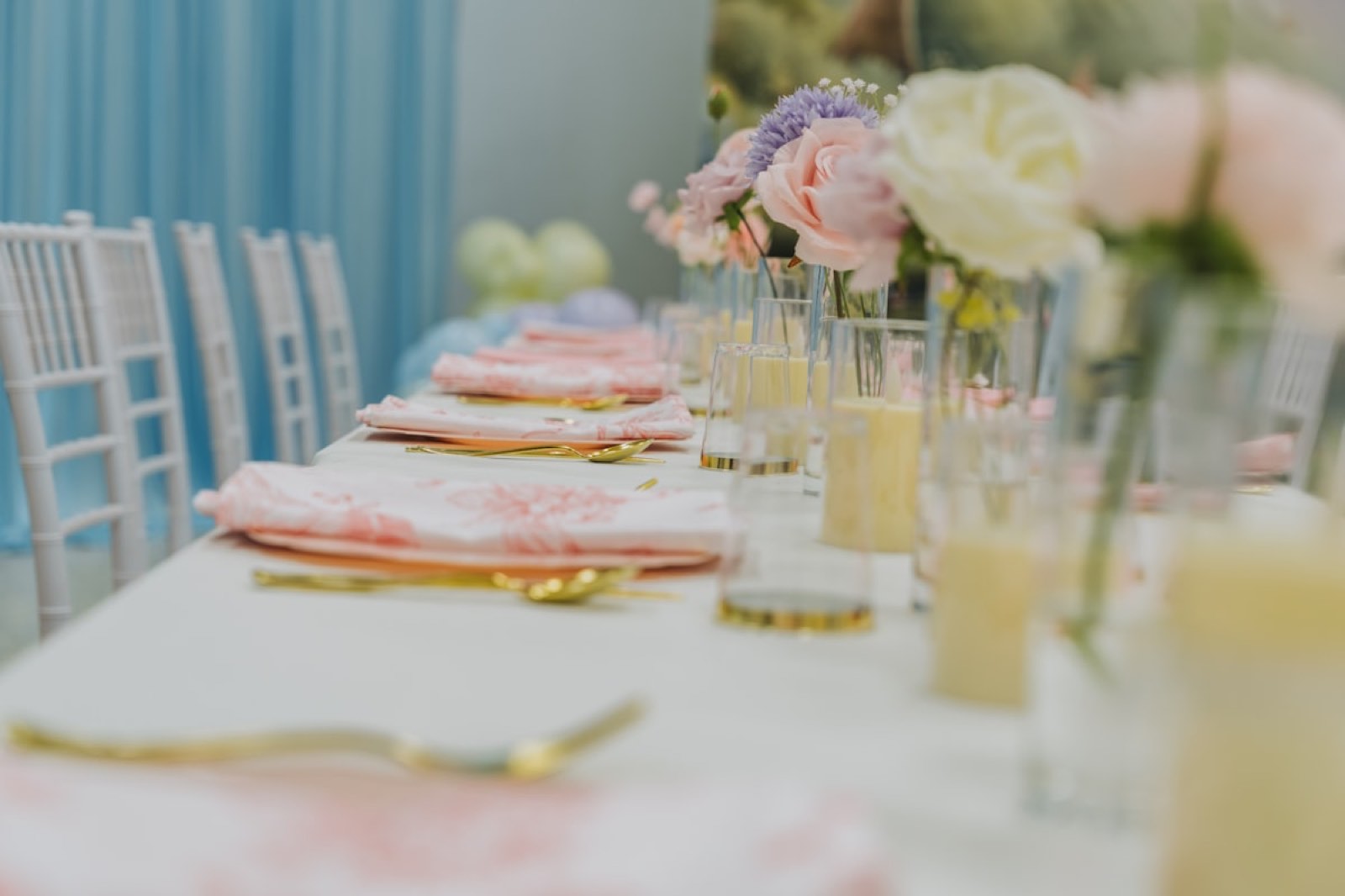 Pastel table setting with florals for a bridal or baby shower